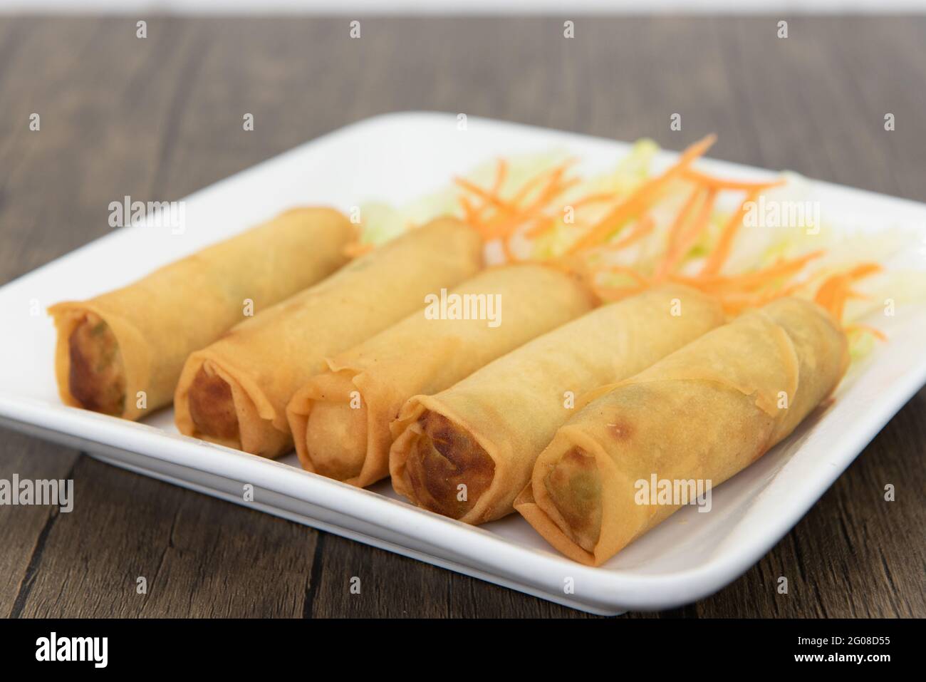 Deep fried egg rolls arranged on a plate as an appetizer for your meal Stock Photo Alamy