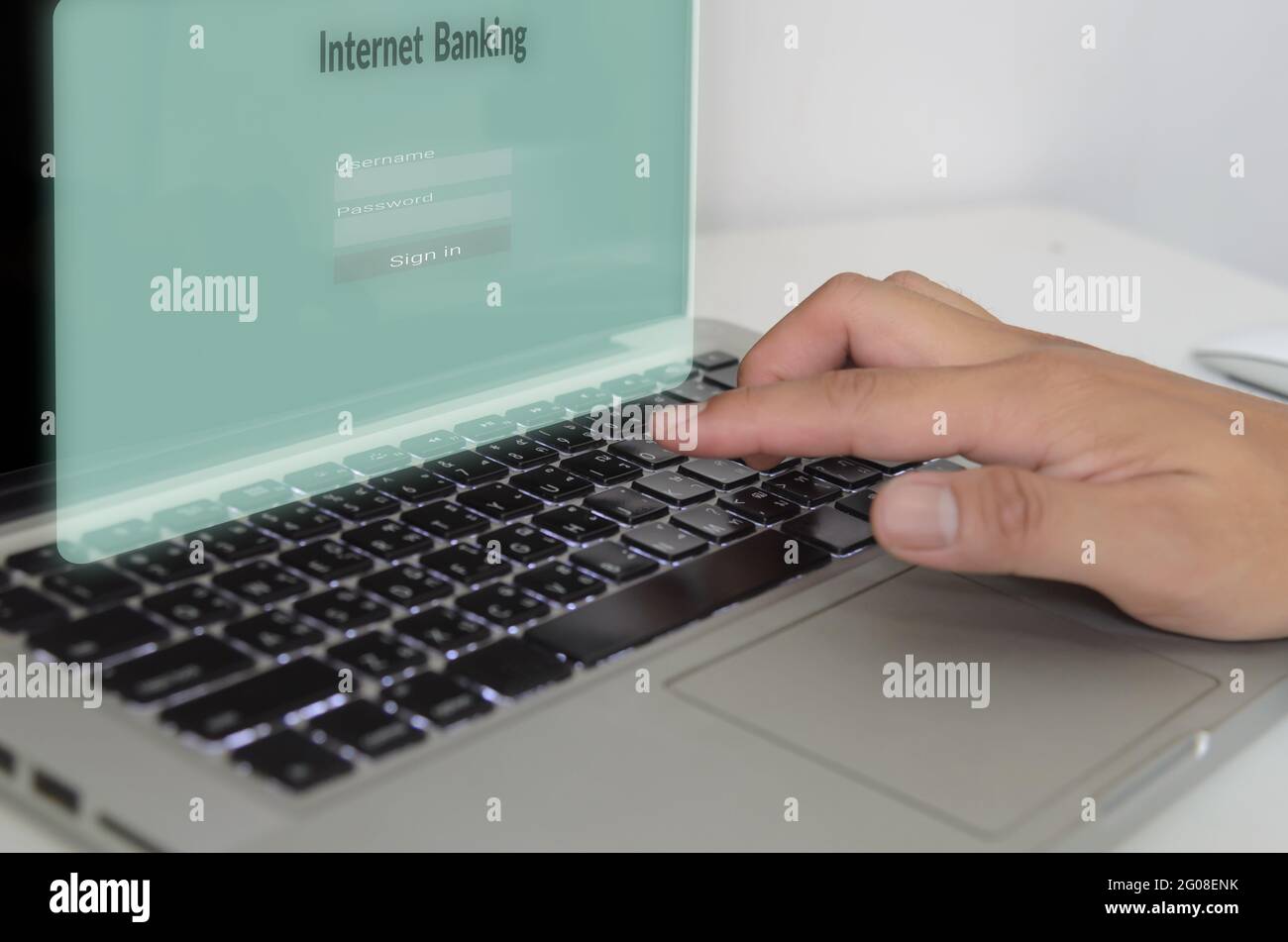 hand is typing the computer keyboard on virtual screen internet banking.Business finance technology concept Stock Photo