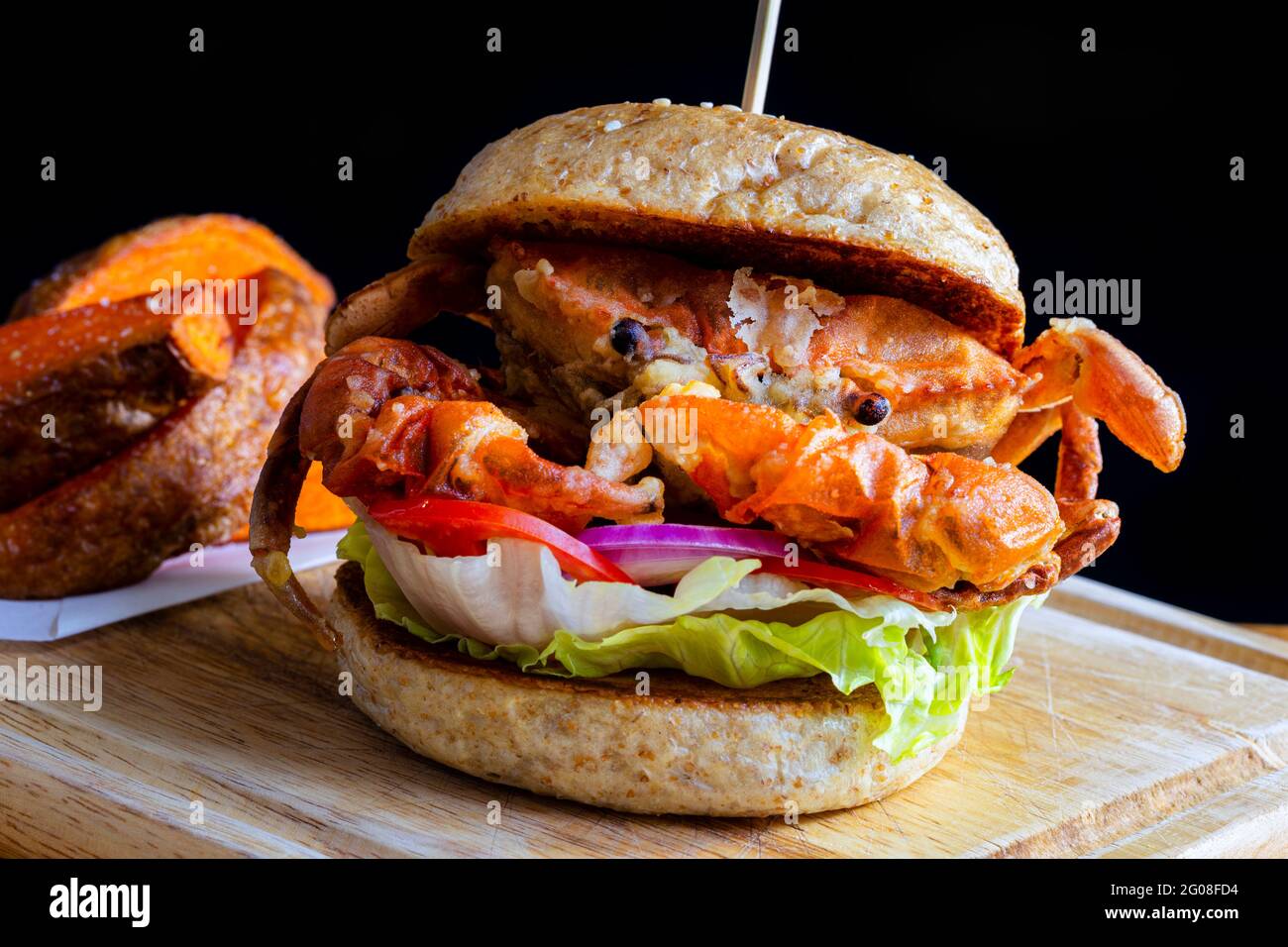Selective focus of crab burger with chips, fusion food Stock Photo Alamy