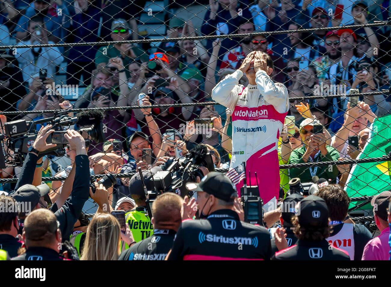 Indianapolis, Indiana, USA. 30th May, 2021. HELIO CASTRONEVES (06) of Sao Paulo, Brazil wins the 105th Running of The Indianapolis 500 at the Indianapolis Motor Speedway in Indianapolis, Indiana. Credit: Eddie Hurskin Grindstone Media/ASP/ZUMA Wire/Alamy Live News Stock Photo