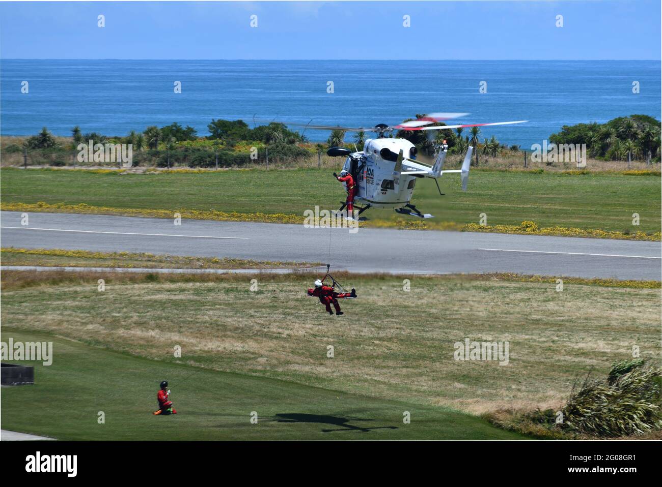 GREYMOUTH, NEW ZEALAND, JANUARY 15, 2021: A rescue helicopter and crew practice rescue operations at the Greymouth airport Stock Photo