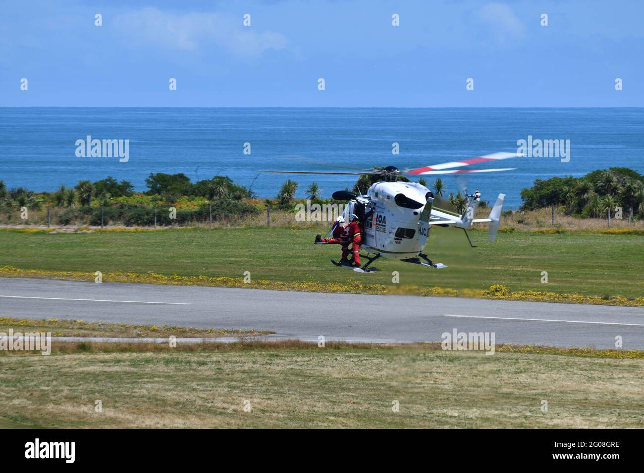 GREYMOUTH, NEW ZEALAND, JANUARY 15, 2021: A rescue helicopter and crew practice rescue operations at the Greymouth airport Stock Photo