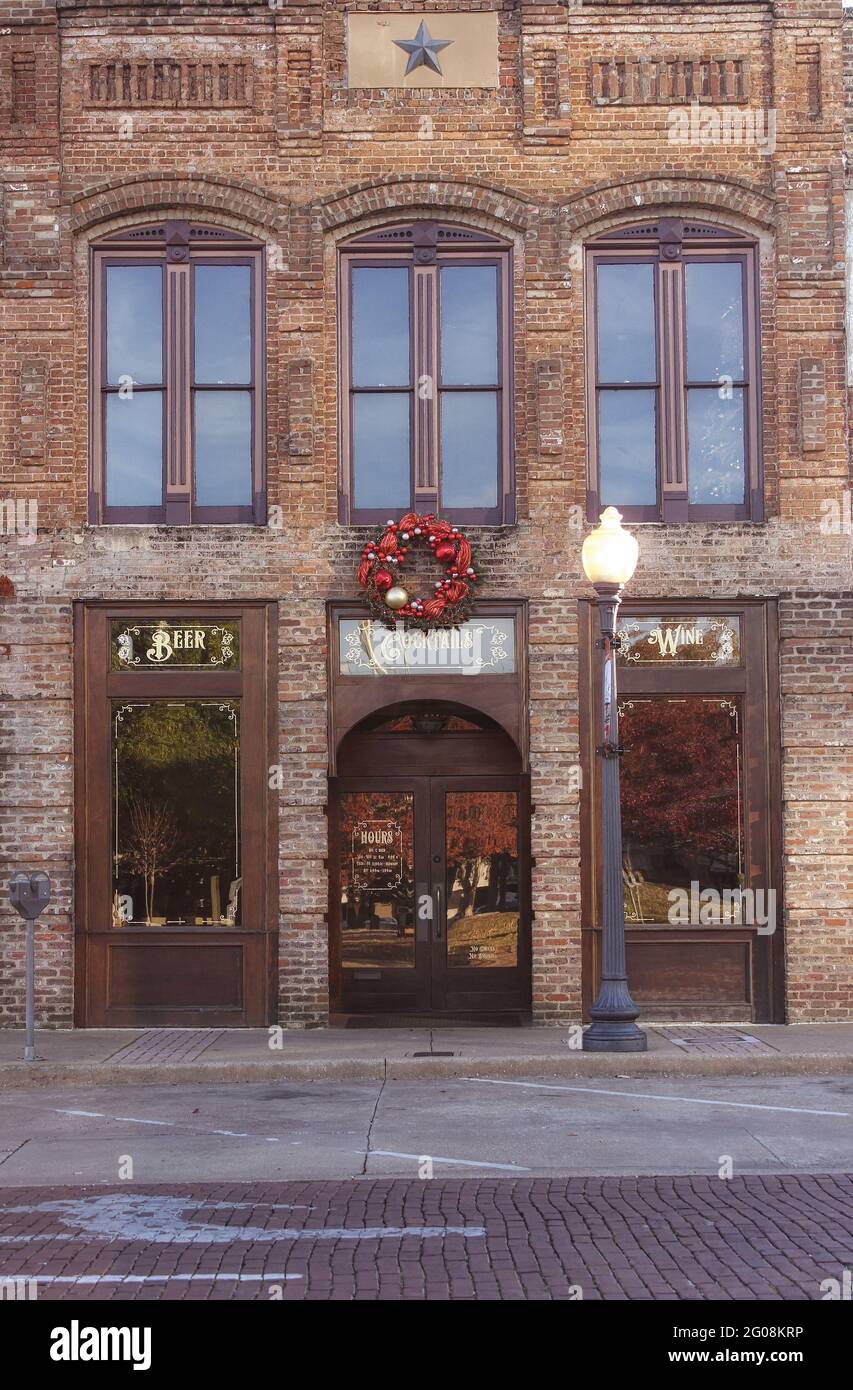 Downtown Historic Bar with Christmas Wreath Restaurant Stock Photo