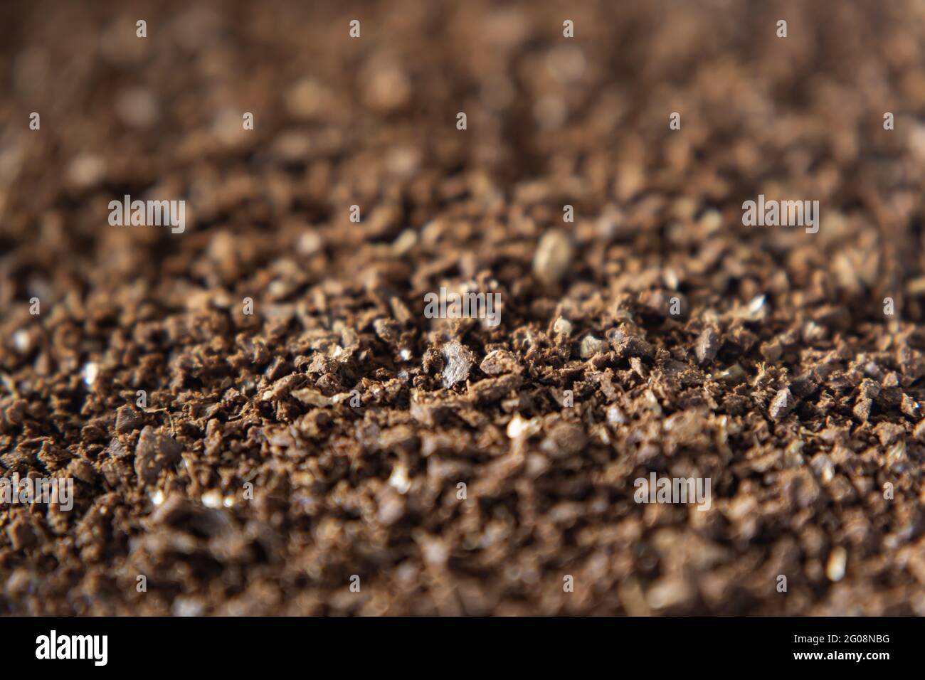 Macro shot of ground roasted coffee beans Stock Photo