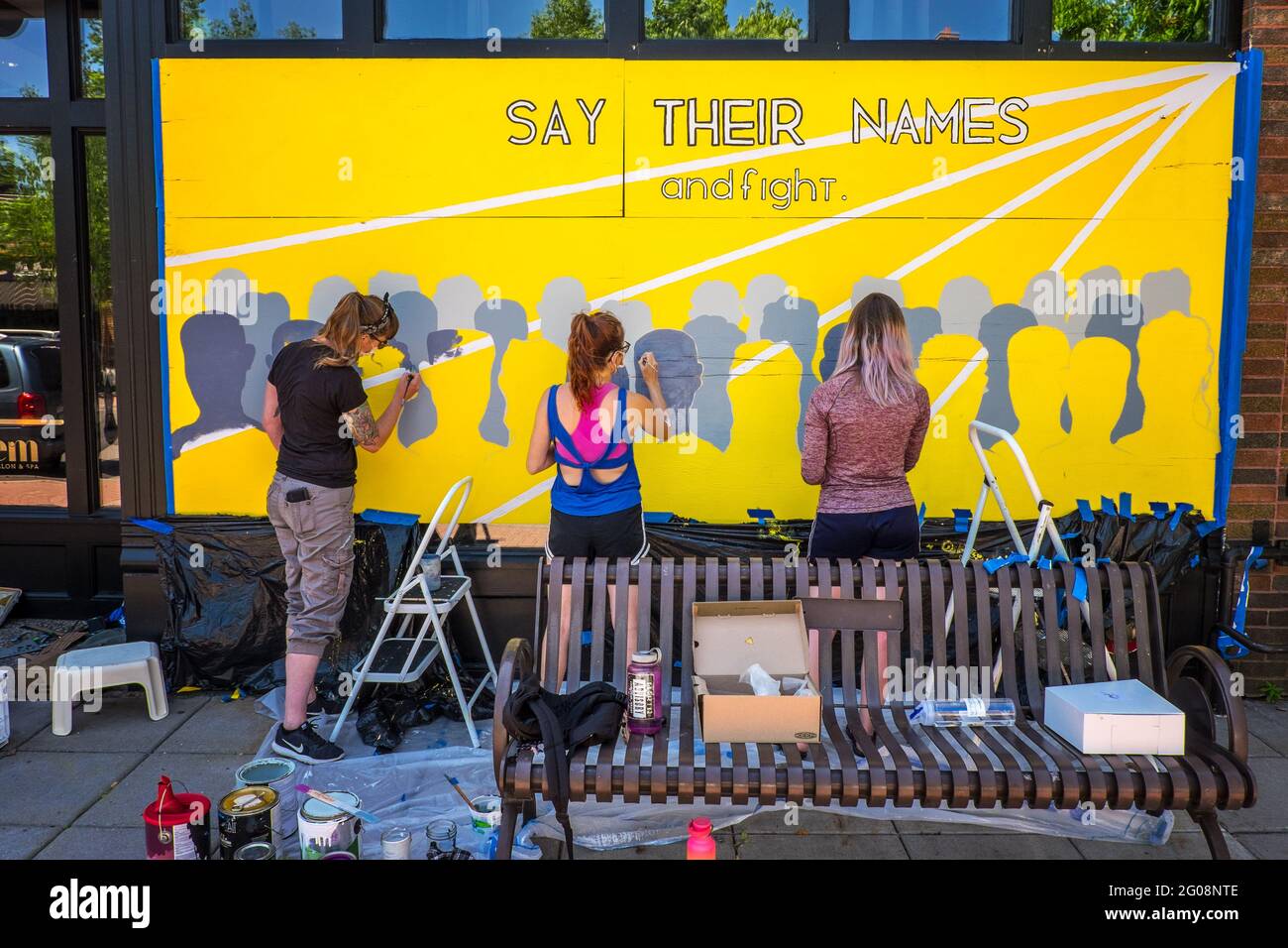 Women paint a mural during the George Floyd protests, St. Paul, Minnesota, USA Stock Photo