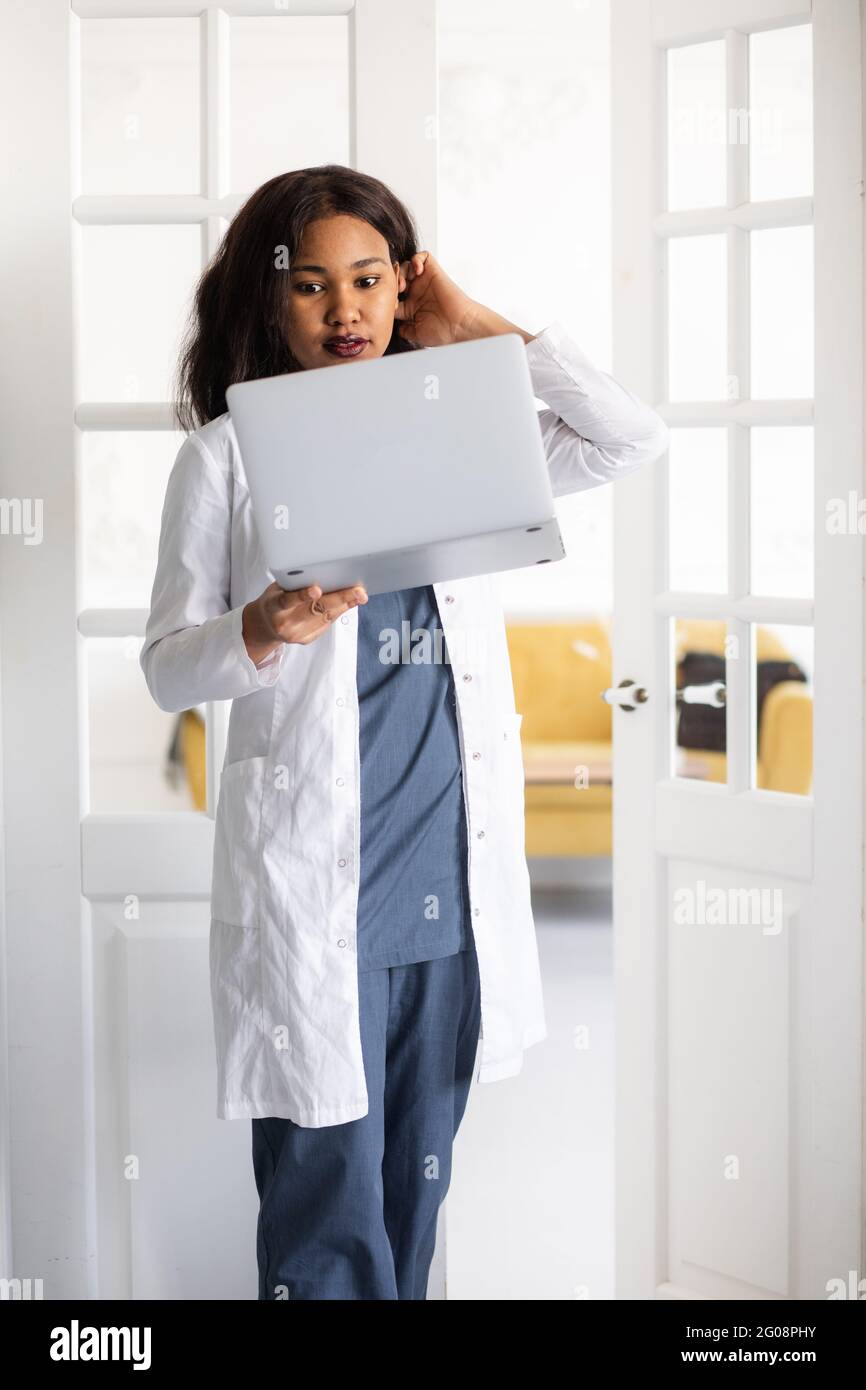 African American nurse video conference with patient. Video communication training, remote work Stock Photo