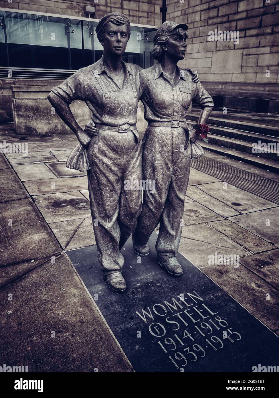 Women of Steel. Women of Steel is a bronze sculpture that commemorates the women of Sheffield who worked in the steel industry during the First war Stock Photo