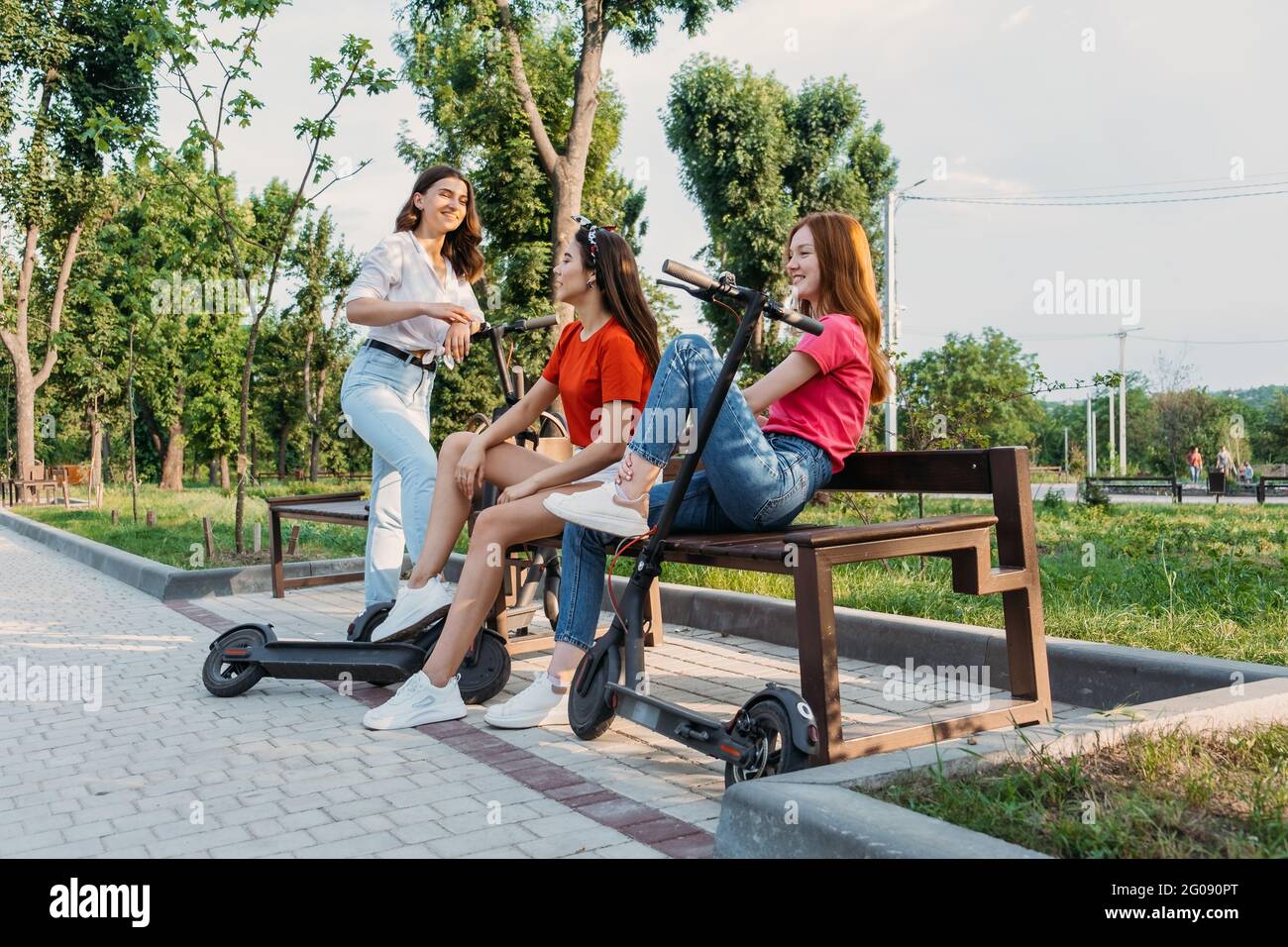 Summer activities for teens and adults. Bicycle and electric scooter