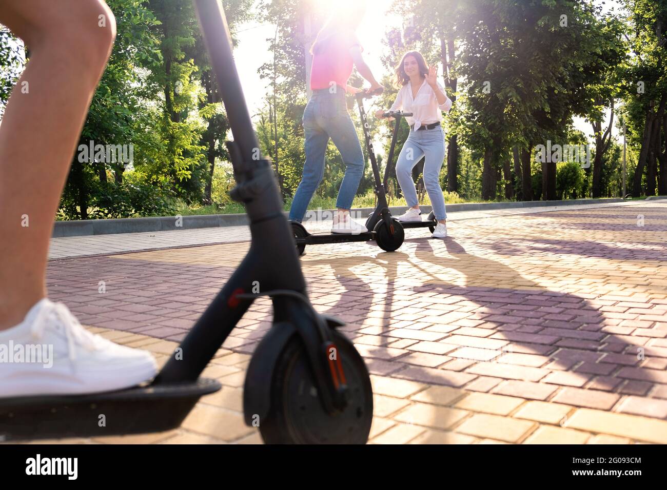 Summer activities for teens and adults. Bicycle and electric scooter