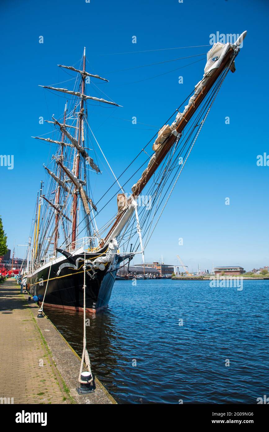 Den Helder, the Netherlands. May 5, 2021. Old clipper moored at the quay of the former shipyard Willemsoord in Den Helder, the Netherlands. High quality photo Stock Photo