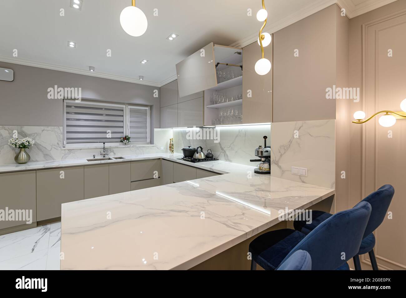 Luxury white modern marble kitchen in studio space Stock Photo Alamy