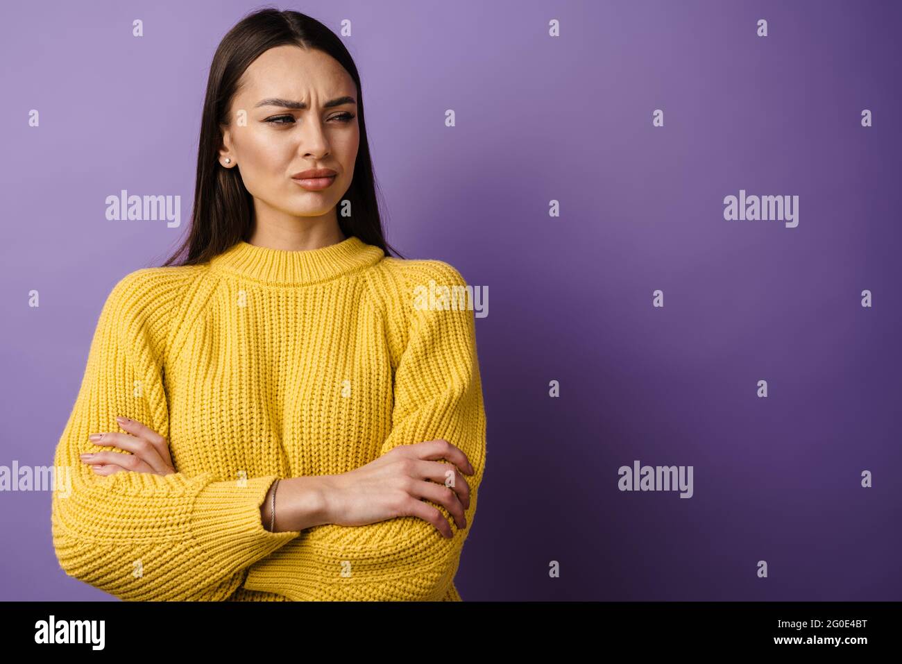 Angry woman folded arms in hi-res stock photography and images - Alamy