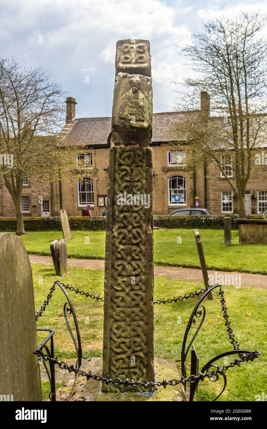 An Anglo-Saxon era stone cross in Eyam village - North edge Stock Photo