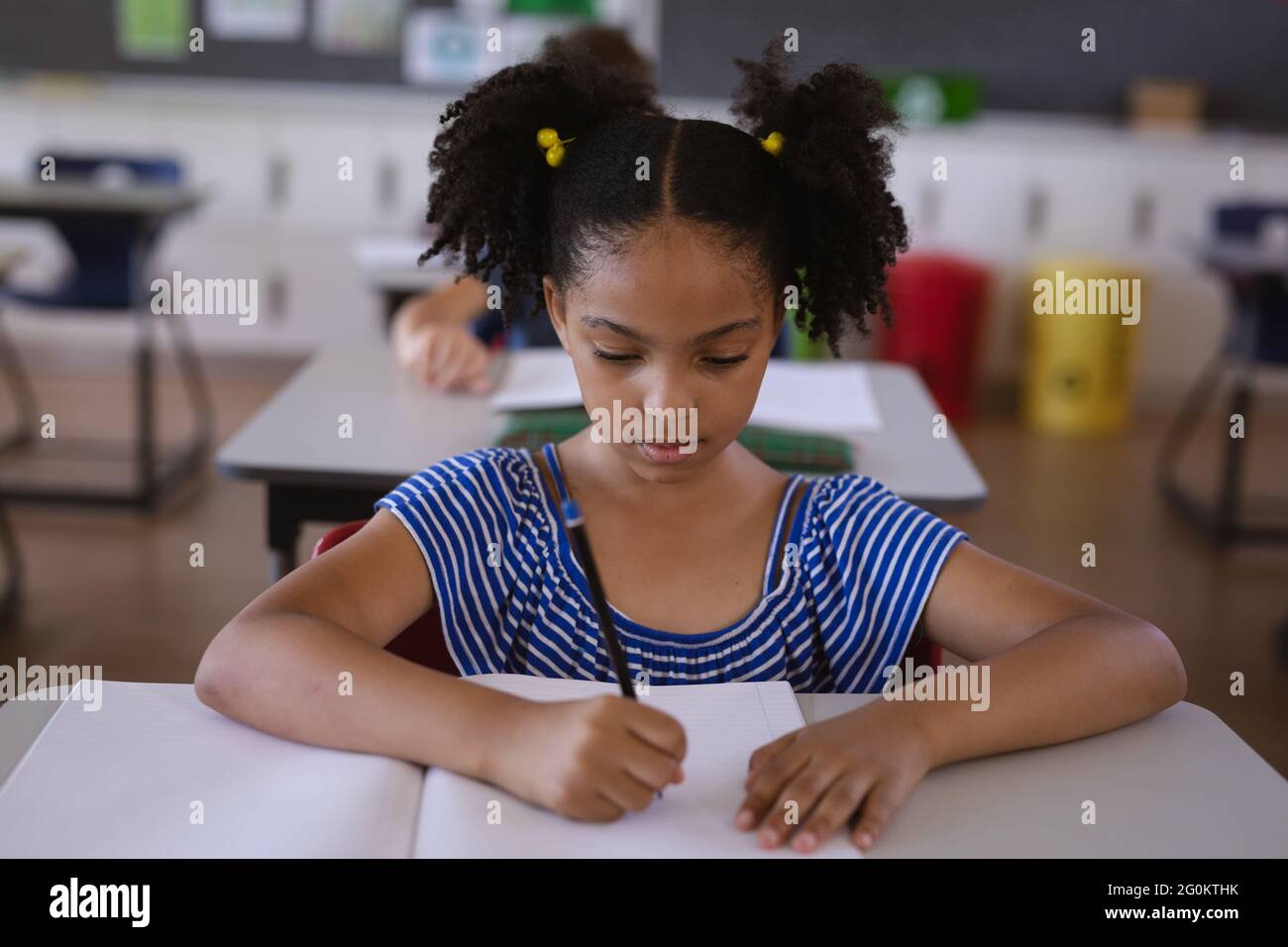 African school girl studying hi-res stock photography and images - Alamy