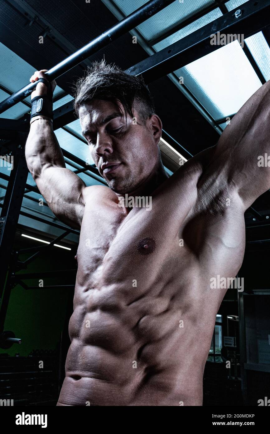 Hanging from a bar hires stock photography and images Alamy