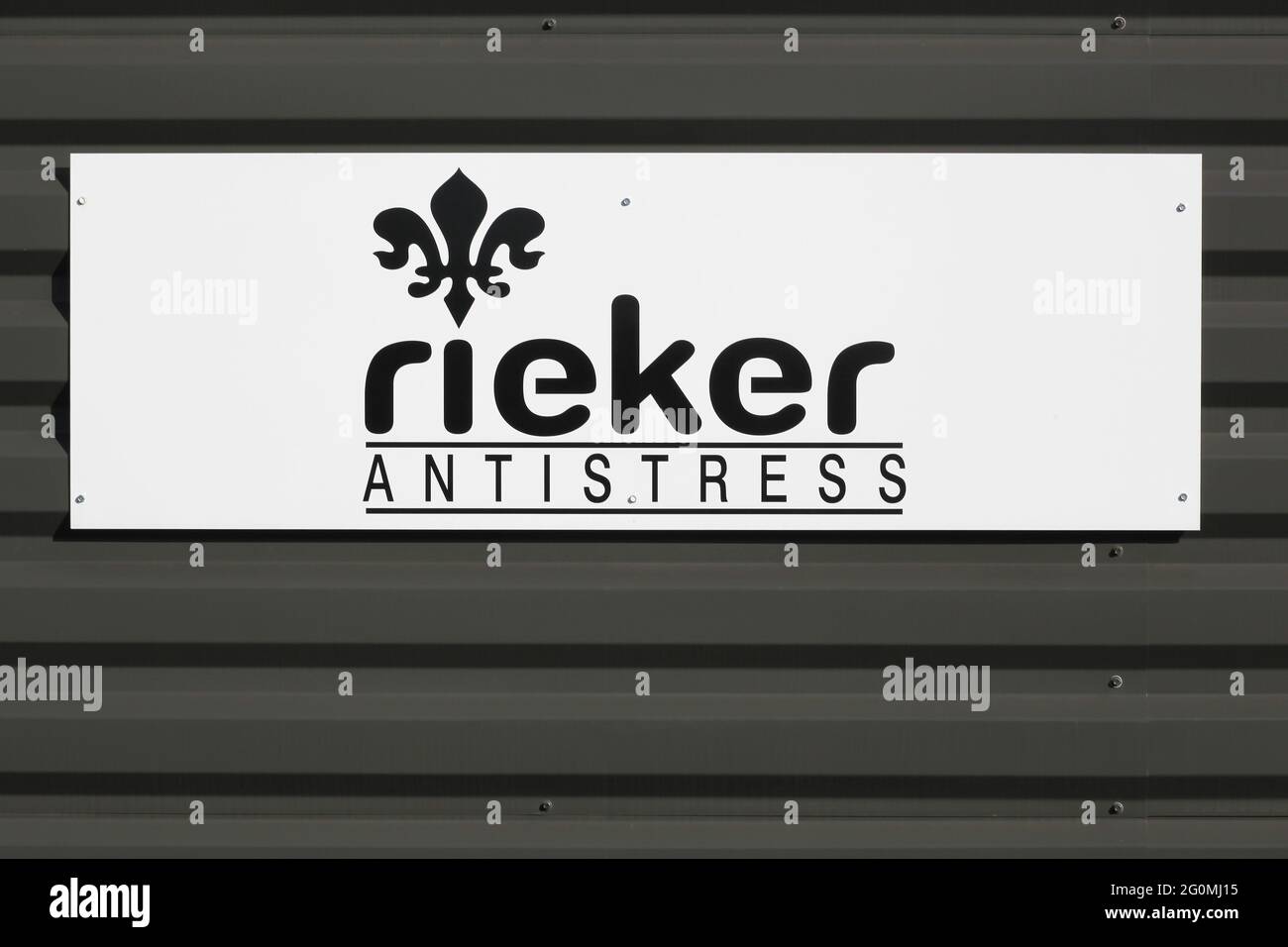 nummer tom aIDS Macon, France - March 15, 2020: Rieker logo on a wall. Rieker is a footwear  and accessories retailer that manufactures shoes and bags Stock Photo -  Alamy
