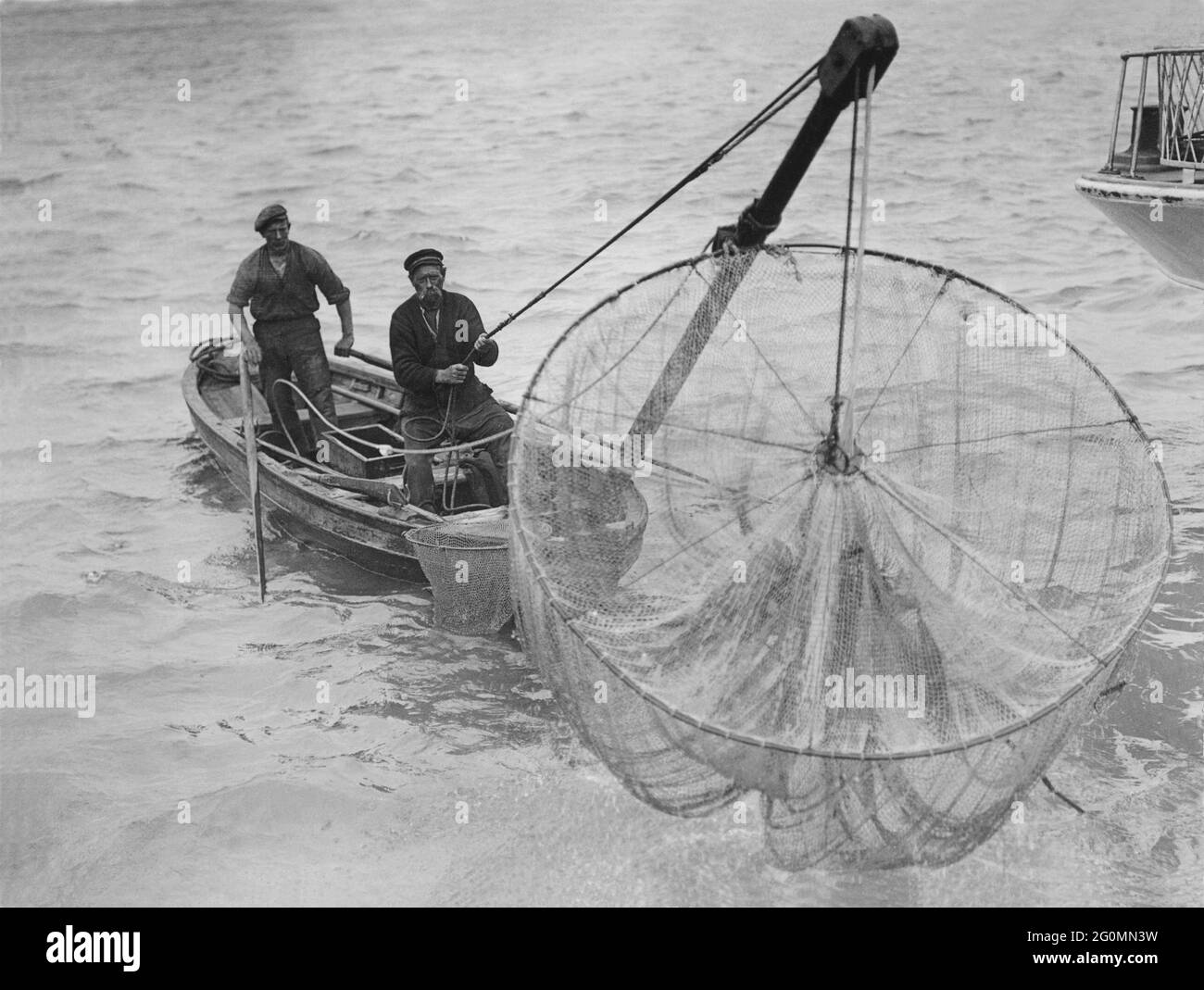 Net fishing boat Black and White Stock Photos & Images - Alamy