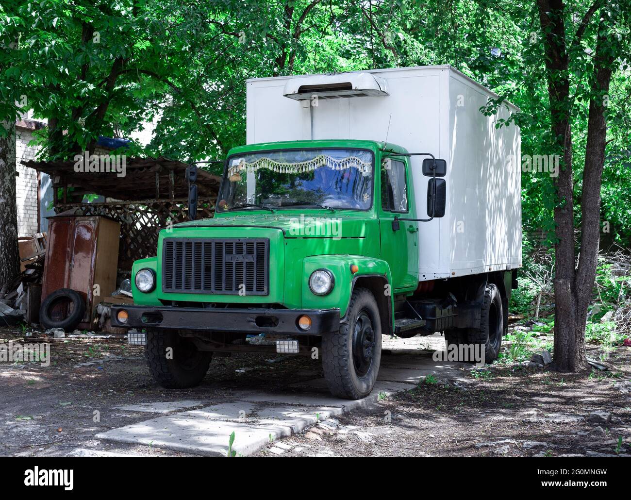 Kharkov, Ukraine - july 01, 2018: Russian soviet refrigerator truck based on GAZ-3307. Old abandoned green car. Junk. Stock Photo