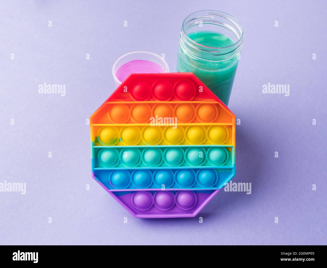 Bubble pop it and colorful slime fidget toys to help reduce stress in kids  and adults Stock Photo - Alamy