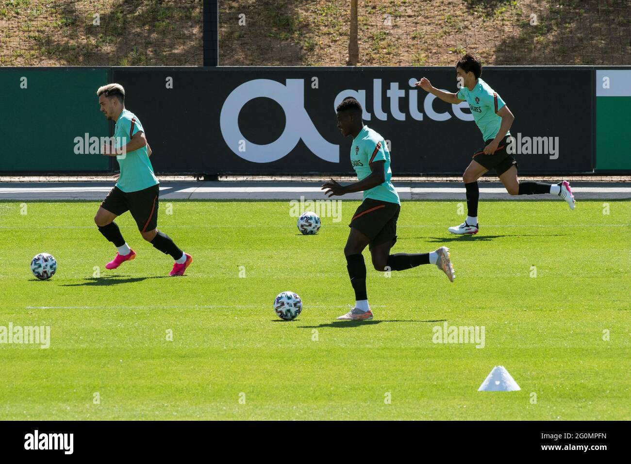 Oeiras, Portugal. 02nd June, 2021. Pedro Goncalves (L), Nuno Mendes (C) and Joao Felix (R) in action during the training session at Cidade do Futebol training ground.Portugal football team trains before competing in the European football championship - EURO 2020 - scheduled to start on June 11th. (Photo by Hugo Amaral/SOPA Images/Sipa USA) Credit: Sipa USA/Alamy Live News Stock Photo