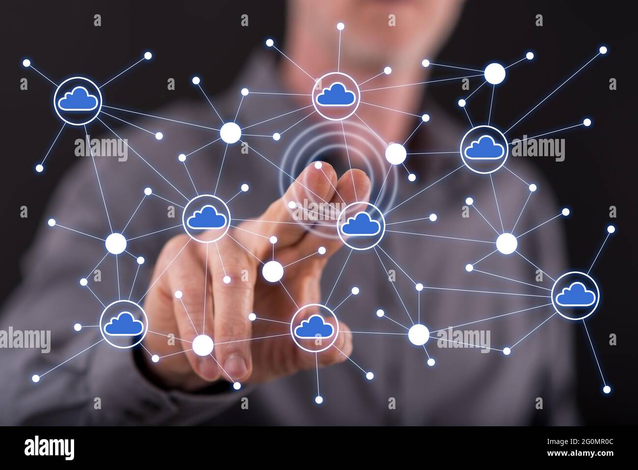 Man touching a cloud networking on a touch screen with his finger Stock ...