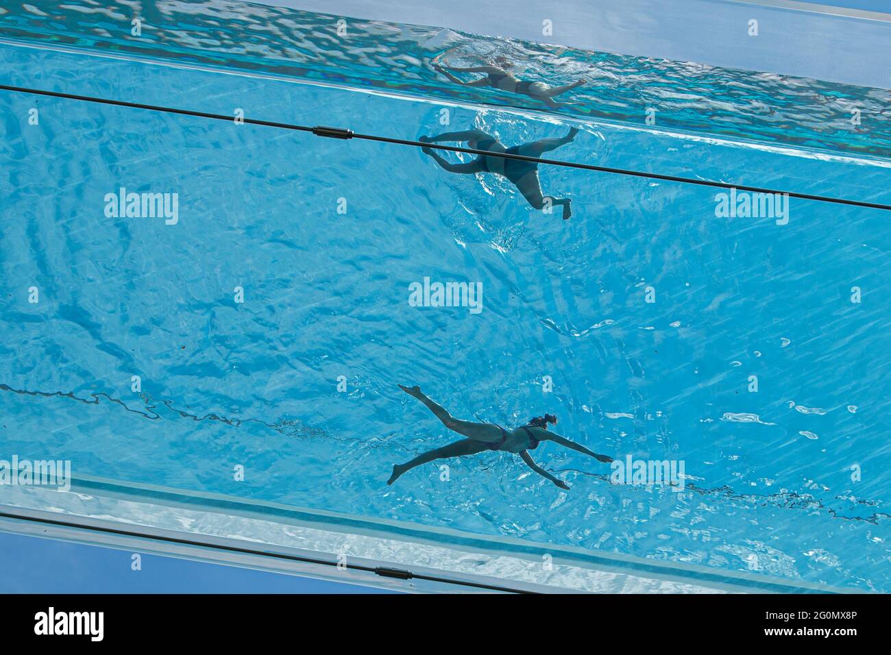 London 2 June 21 Swimmers Cool Off At The Transparent Skypool At Embassy Gardens In London On Another Hot Day In The Capital During A Mini Heatwave With Temperatures Exceeding 25c London 2 June 21 Swimmers Cool Off At The Transparent Skypool At Embassy Gardens In London On Another Hot Day In The Capital During A Mini Heatwave With Temperatures Exceeding 25c