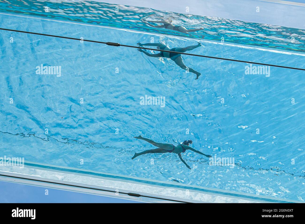 London 2 June 21 Swimmers Cool Off At The Transparent Skypool At Embassy Gardens In London On Another Hot Day In The Capital During A Mini Heatwave With Temperatures Exceeding 25c London 2 June 21 Swimmers Cool Off At The Transparent Skypool At Embassy Gardens In London On Another Hot Day In The Capital During A Mini Heatwave With Temperatures Exceeding 25c