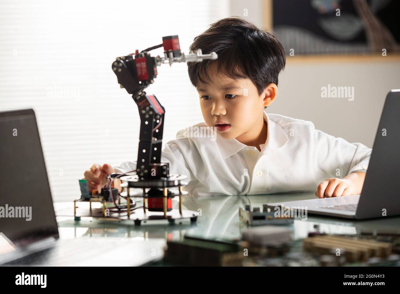 Students learning robot programming Stock Photo - Alamy