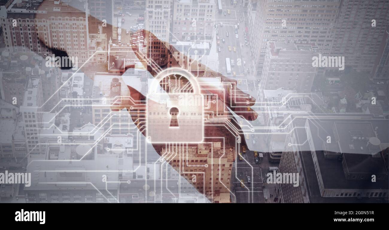 Composition of online security padlock icon over handshake and ...