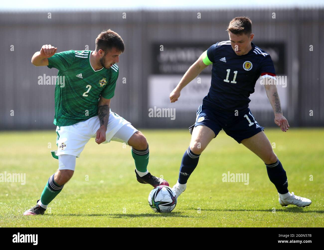 Northern Ireland's Jack Scott (left) and Scotland's Glenn Middleton battle for the ball during the International Friendly at C&G Systems Stadium, Dumbarton. Picture date: Wednesday June 2, 2021. Stock Photo