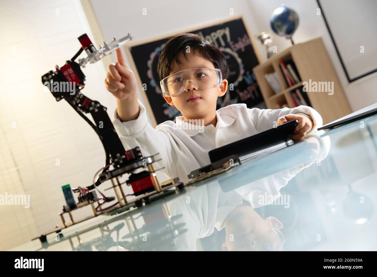 Students learning robot programming Stock Photo - Alamy