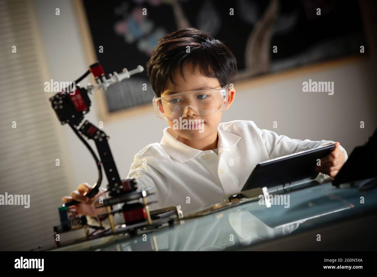 Students learning robot programming Stock Photo - Alamy