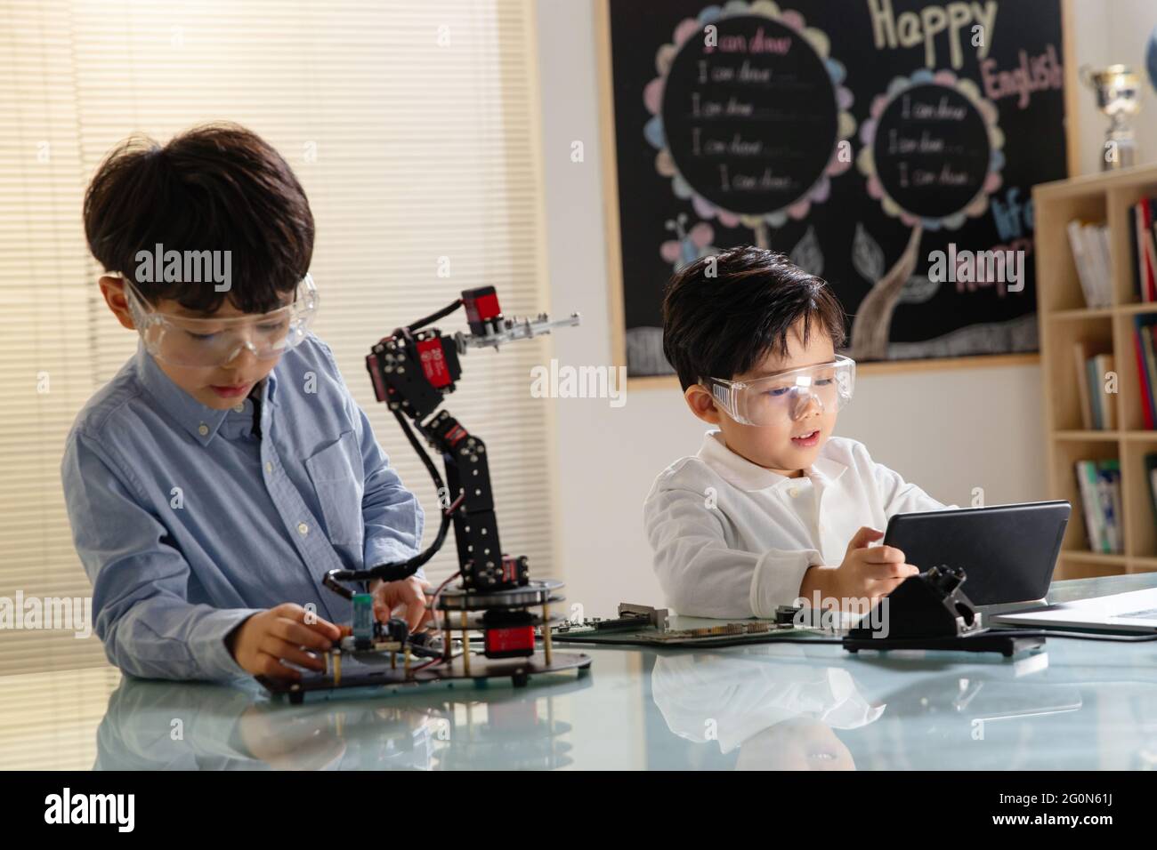 Students learning robot programming Stock Photo - Alamy
