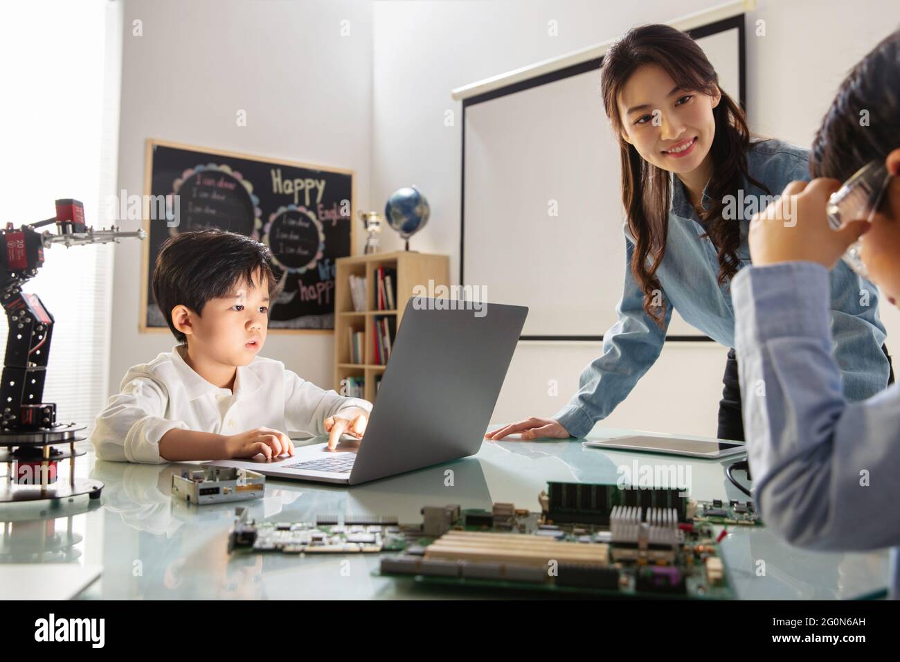 Students learning robot programming Stock Photo - Alamy