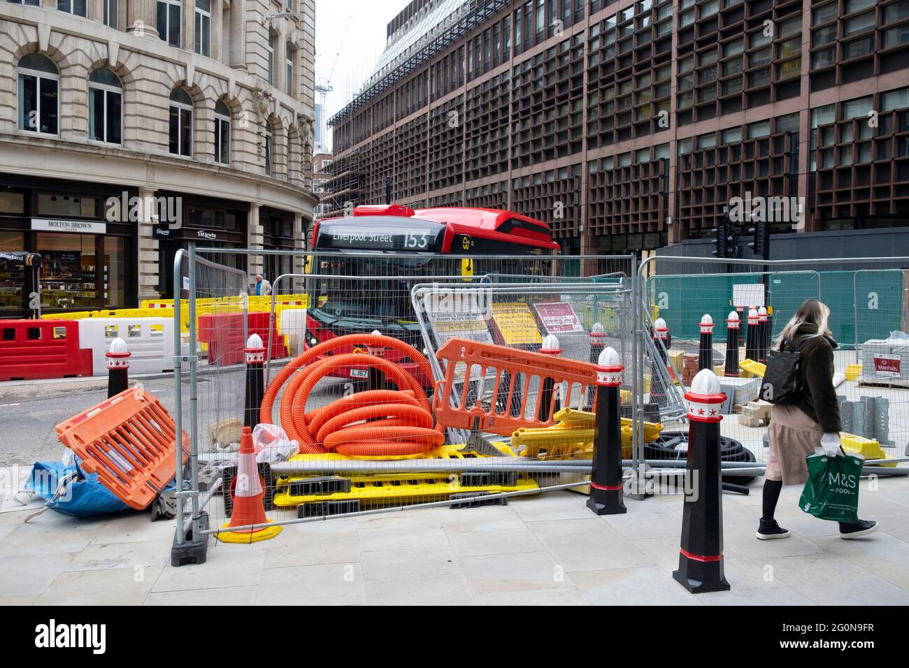 Roadworks near the new Broadgate development by Liverpool Street Station and the Elizabeth Line construction site in London England UK KATHY DEWITT Stock Photo