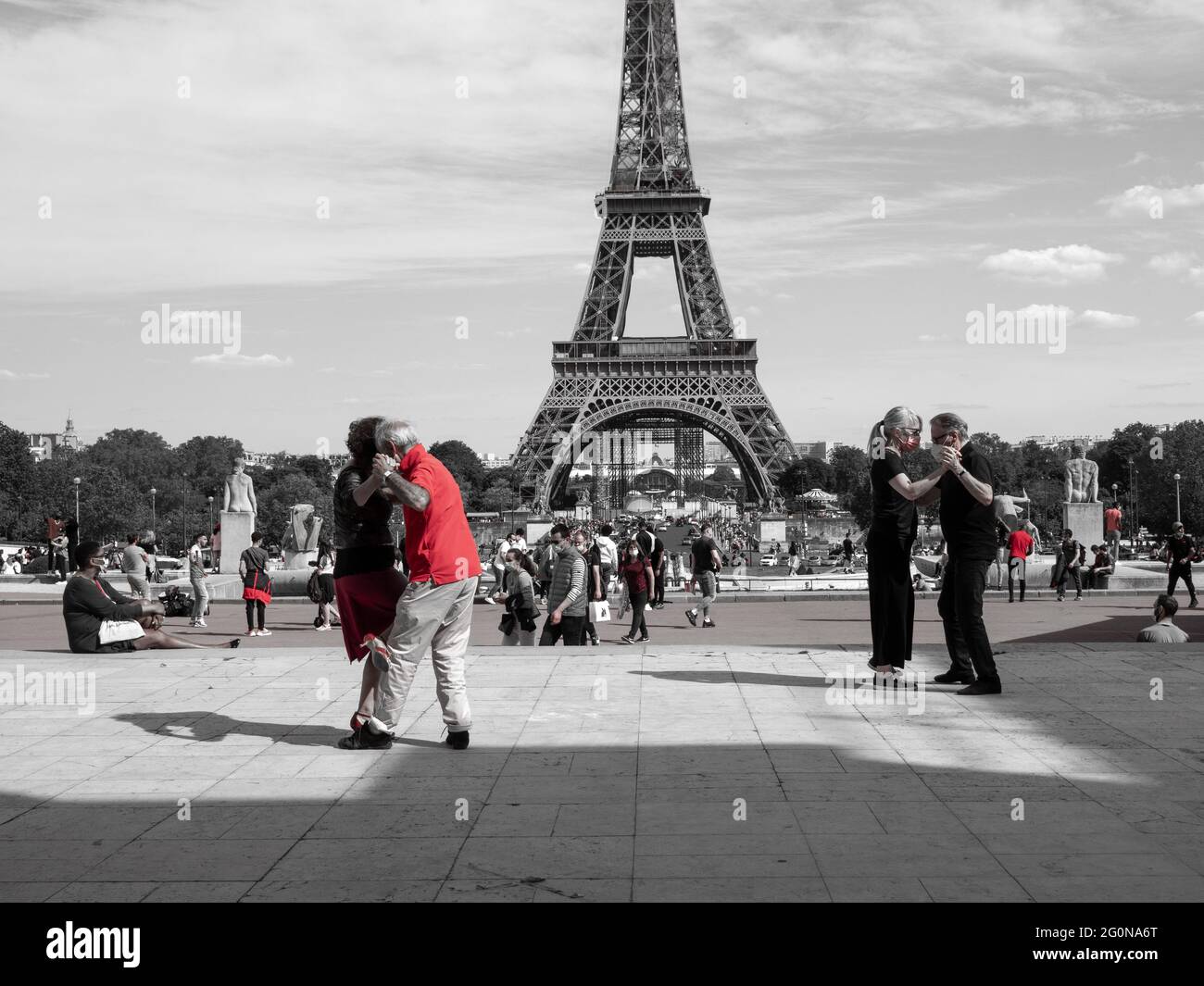 Paris, France, May 2021. Dancing Argentine couples tango on the Tracadero Square in the background the Eiffel Tower symbol of Paris, city of love, bla Stock Photo