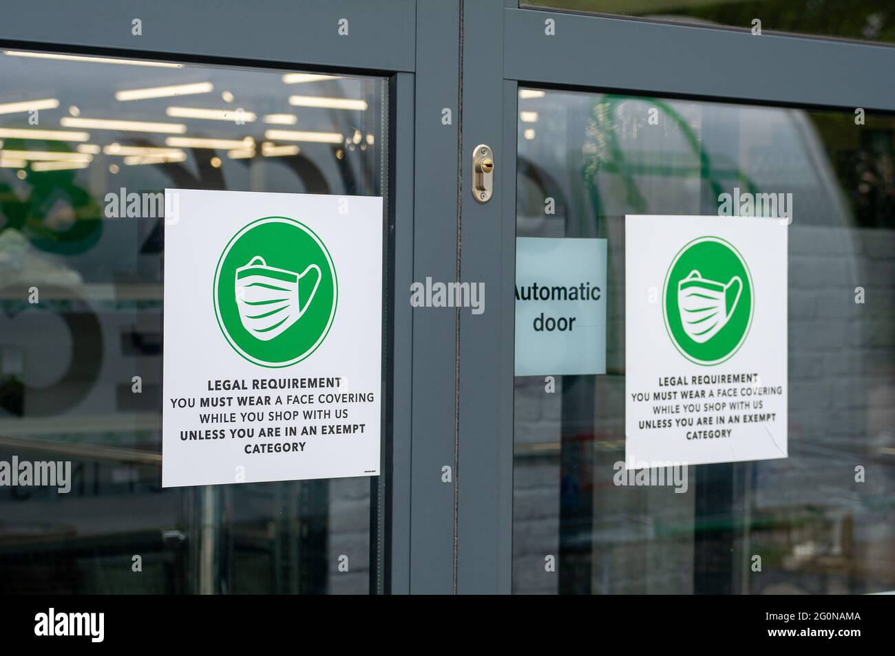 Slough, Berkshire, UK. 2nd June, 2021. Social distancing signs outside the Dunelm store in Slough. Homeware company Dunelm have seen sales growth at a  “very strong” level since it's stores reopened from 12 April 2021. Credit: Maureen McLean/Alamy Stock Photo
