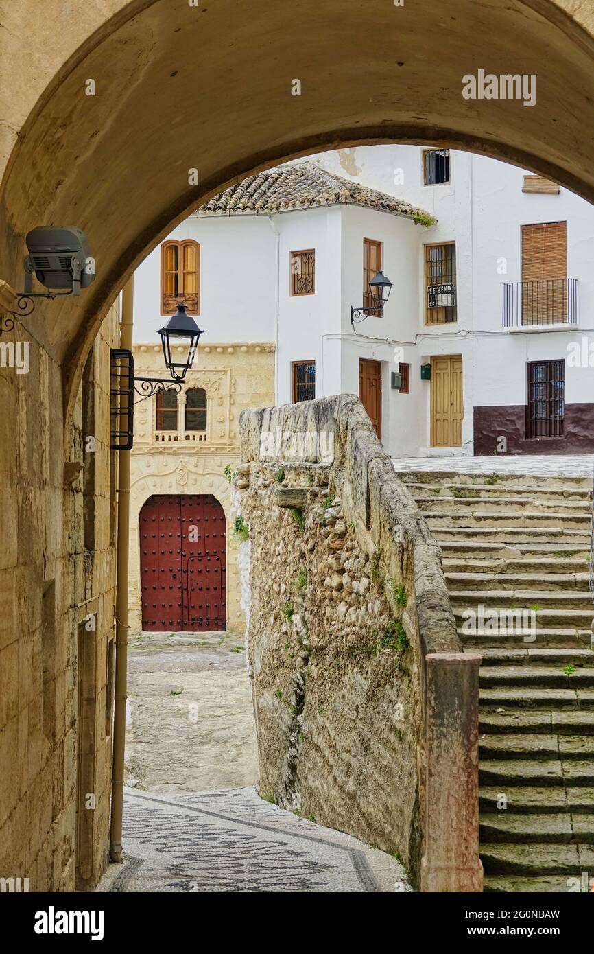 Narrow streets with stone stairs in Alhama de Granada (Spain), a town of historical and tourist interest Stock Photo