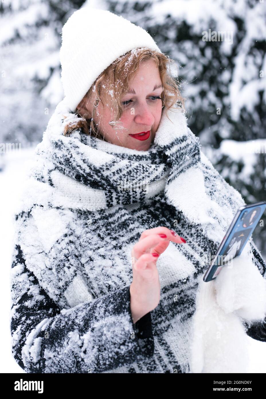 A person taking a selfie in the snow Stock Photo