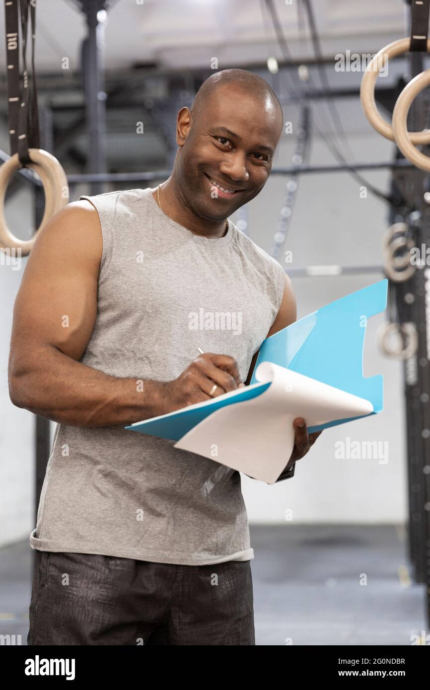 Gym instructor man black american hi-res stock photography and images -  Alamy