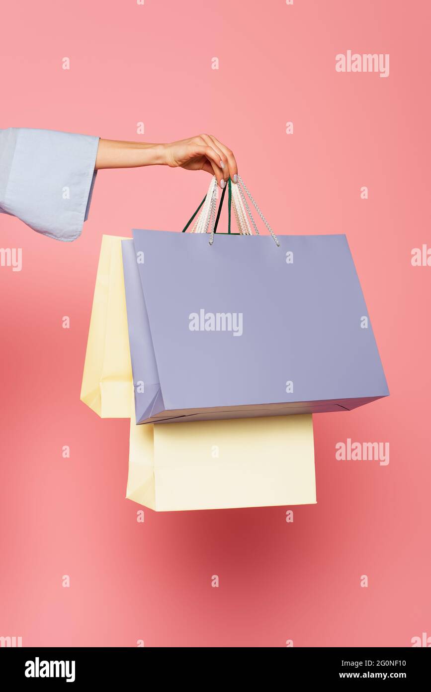 Hand holding shopping bags hires stock photography and images Alamy