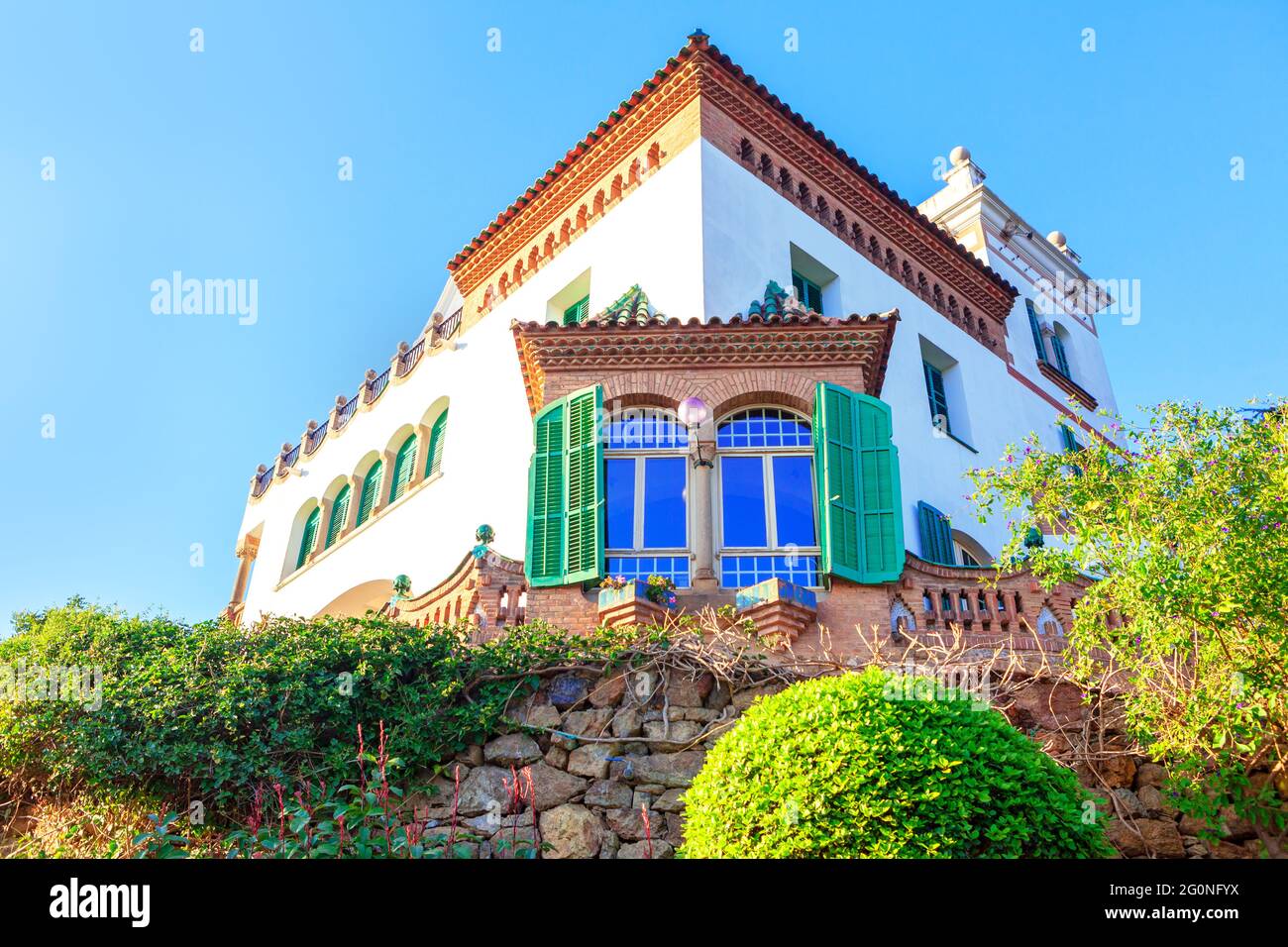 Residential house in traditional Spanish style . Windows with shutters