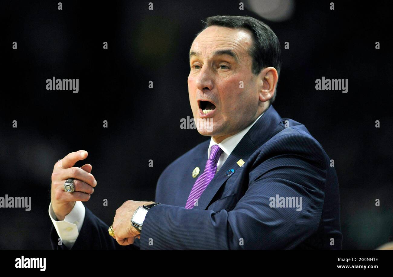 In the second round of the 2016 NCAA Tournament, Duke head coach Mike Krzyzewski yells to his players during action against Yale at the Dunkin Donuts Center in Providence, R.I. (Photo by Brad Horrigan/Hartford Courant/TNS/Sipa USA) Stock Photo