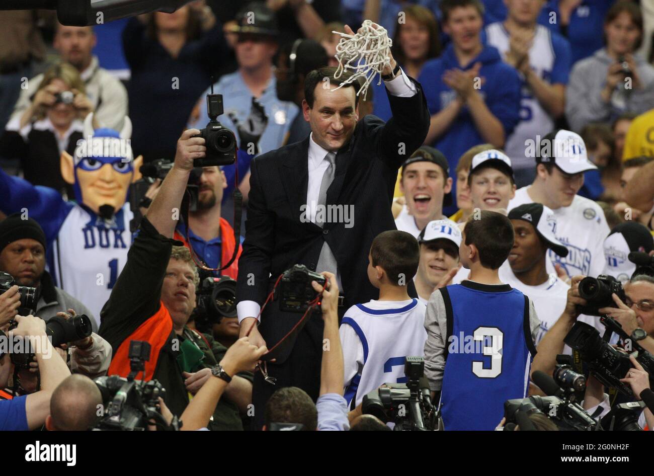 Atlanta, USA. 15th Mar, 2009. Duke head coach Mike Krzyzewski holds the net after the Blue Devils defeated Florida State 79-69, during the final in the ACC men's basketball tournament at the Georgia Dome in Atlanta, Georgia, on Sunday, March 15, 2009. (Photo by Ethan Hyman/Raleigh News & Observer/MCT/Sipa USA) Credit: Sipa USA/Alamy Live News Stock Photo