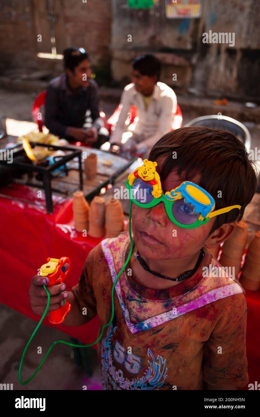 Portrait of Indian boy wearing colourful spectacles Stock Photo