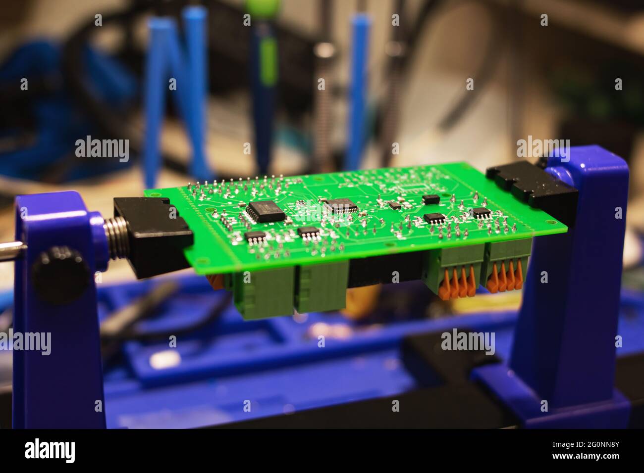 Soldering process on a green PCB close up Stock Photo Alamy
