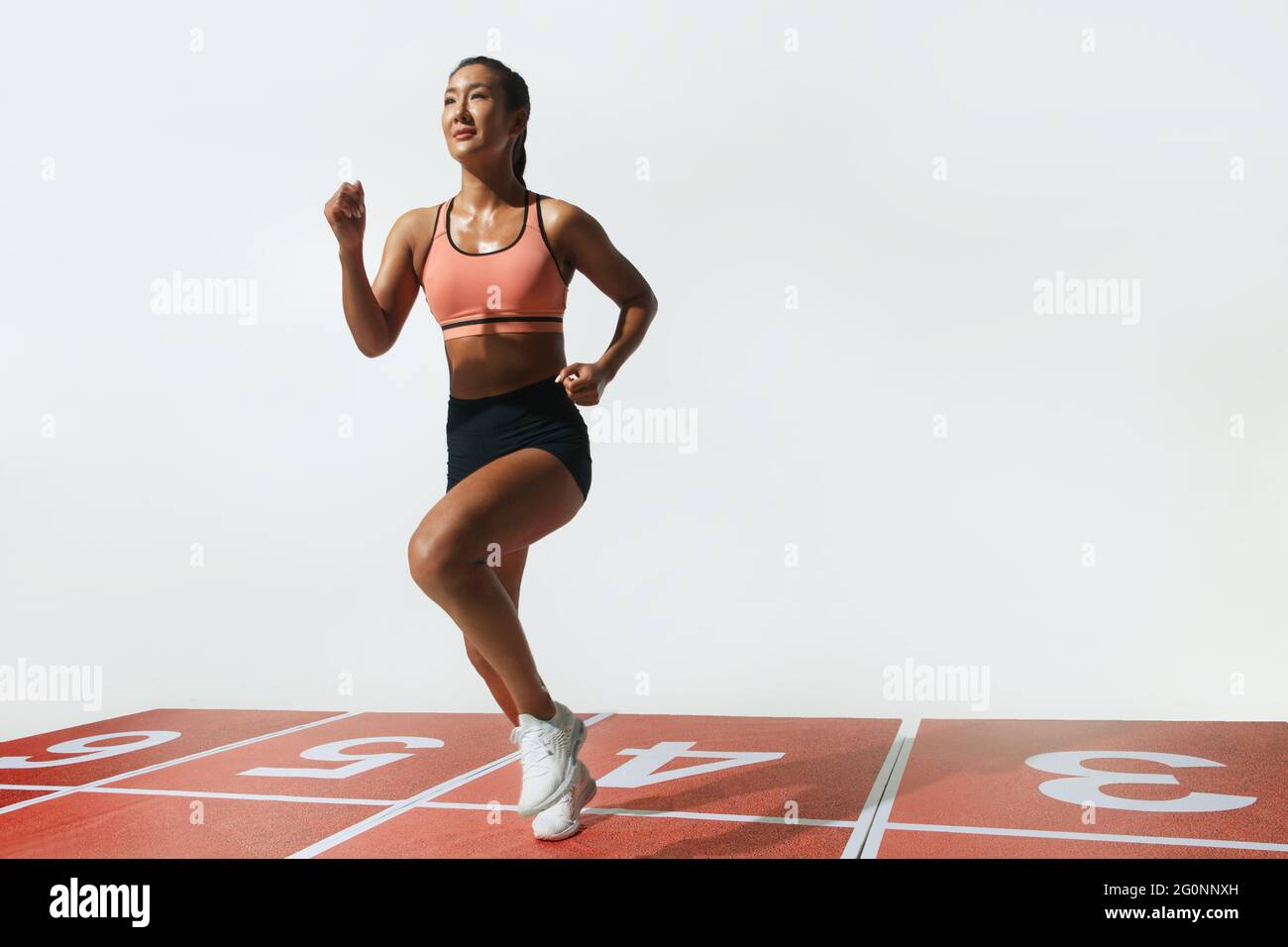 Female athletes race Stock Photo - Alamy