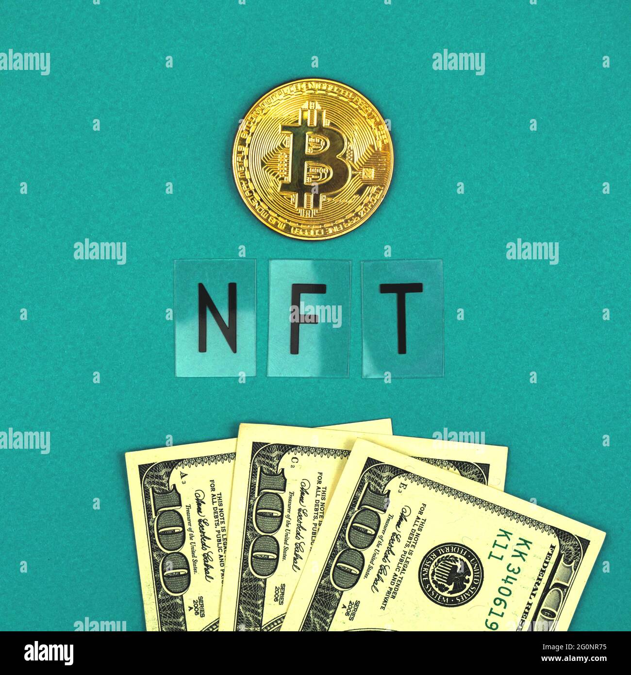 Bitcoin, NFT non fungible token and dollar bills on a office table, new  money concept, top view Stock Photo - Alamy