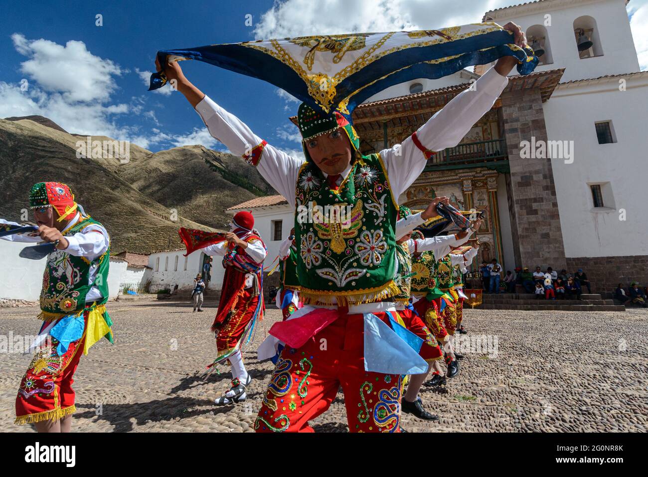 Peruvian folkloric dance, with colorful costumes in front of The Church ...