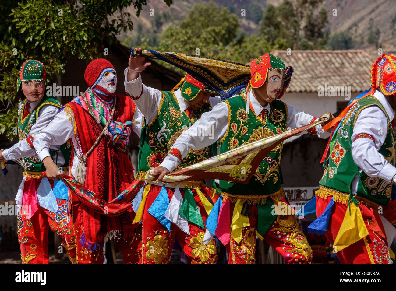 Peruvian Folkloric Dance With Colorful Costumes In Front Of The Church 